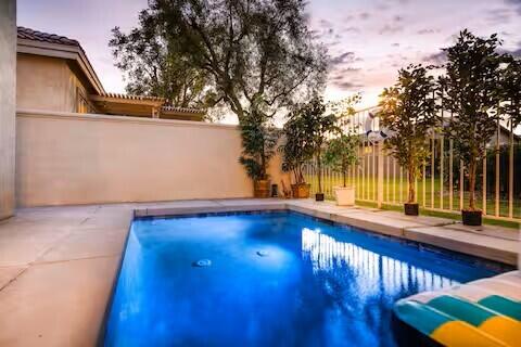 49527 Wayne Street Indio, CA 92201 - Photo 49 of 147 a view of swimming pool with an outdoor space