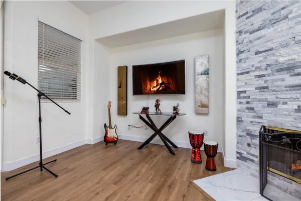 a spacious bathroom with a sink a mirror and a bathtub