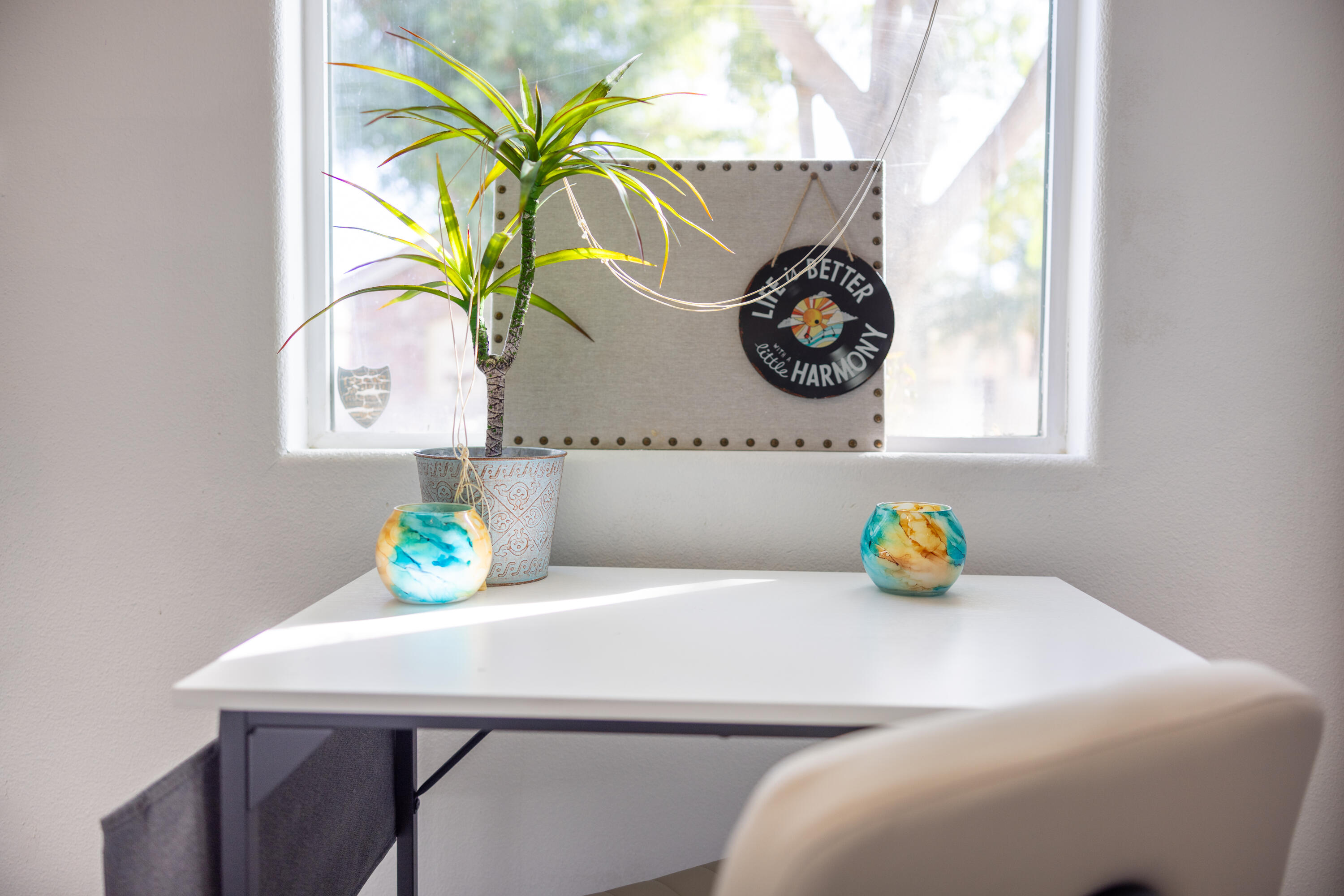 49527 Wayne Street Indio, CA 92201 - Photo 75 of 147 a bathroom with a sink a mirror and a window