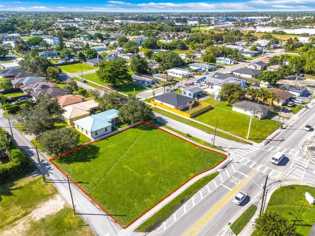 an aerial view of a pool patio swimming pool and outdoor seating