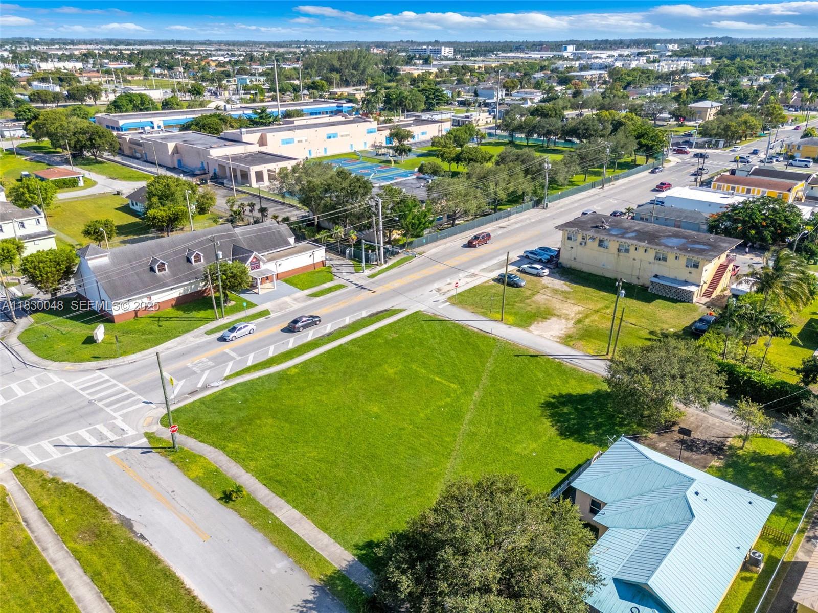 604 Southwest 6th Avenue Homestead, FL 33030 - Photo 6 of 18 an aerial view of tennis court