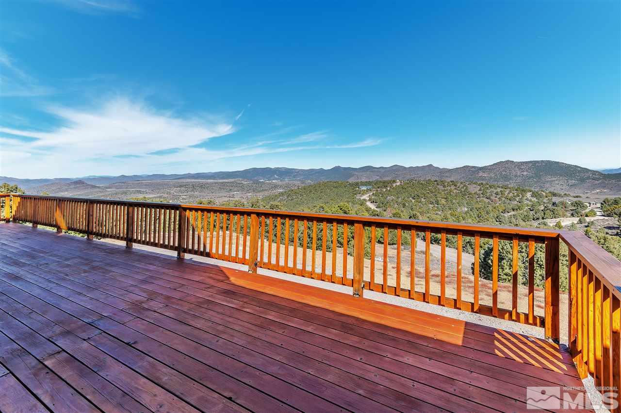 4820 Livery Road Reno, NV 89521 - Photo 21 of 25 a view of wooden balcony with a lake view