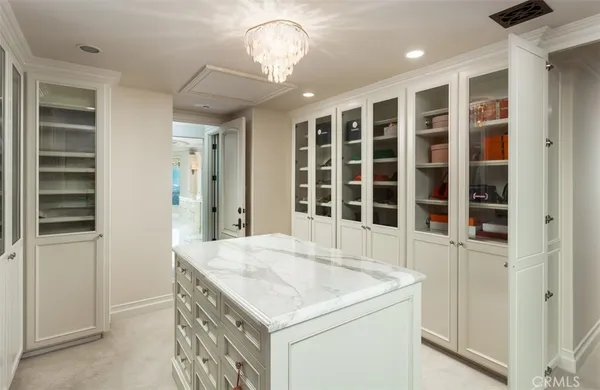 an empty room with a washer and dryer