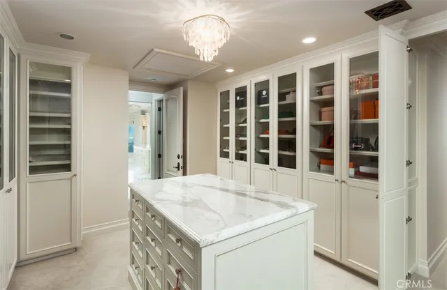 an empty room with a washer and dryer