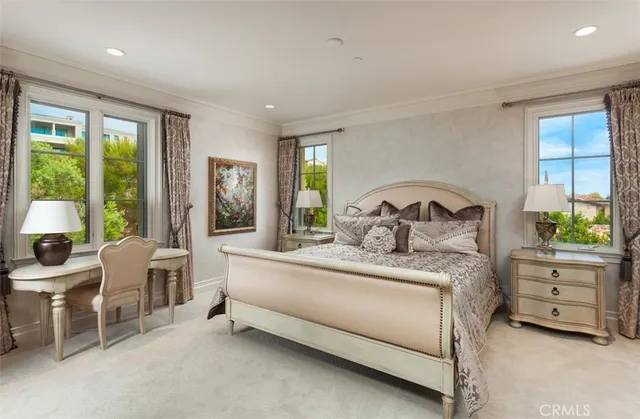 a bathroom with a sink toilet a mirror and vanity