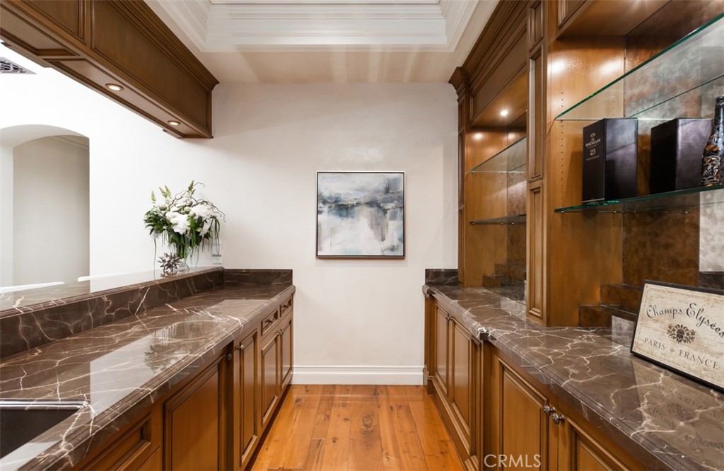 1 Shell Beach Newport Coast, CA 92657 - Photo 37 of 46 a kitchen with stainless steel appliances granite countertop a stove a sink and a refrigerator