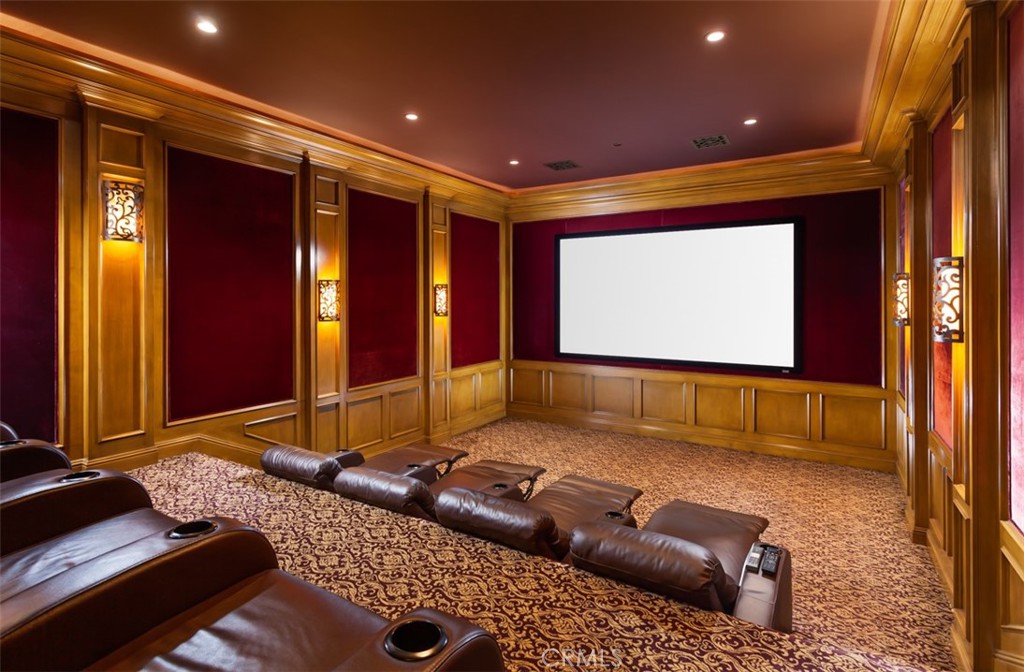 1 Shell Beach Newport Coast, CA 92657 - Photo 38 of 46 a living room with a couch and a flat screen tv