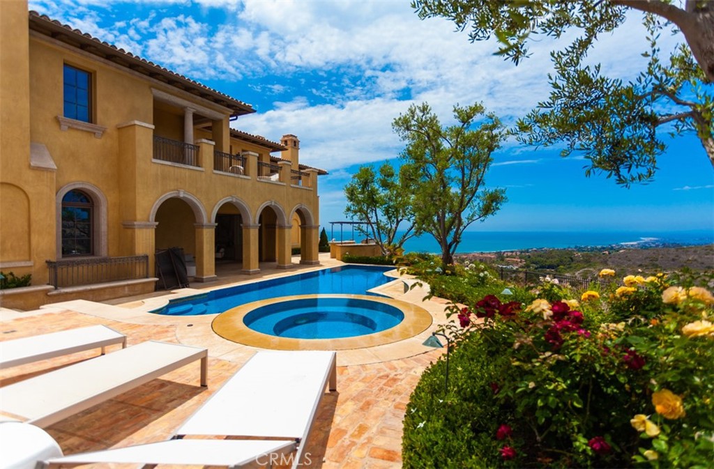 1 Shell Beach Newport Coast, CA 92657 - Photo 45 of 46 a view of swimming pool with an outdoor seating