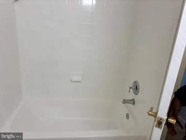 a bathroom with a bathtub