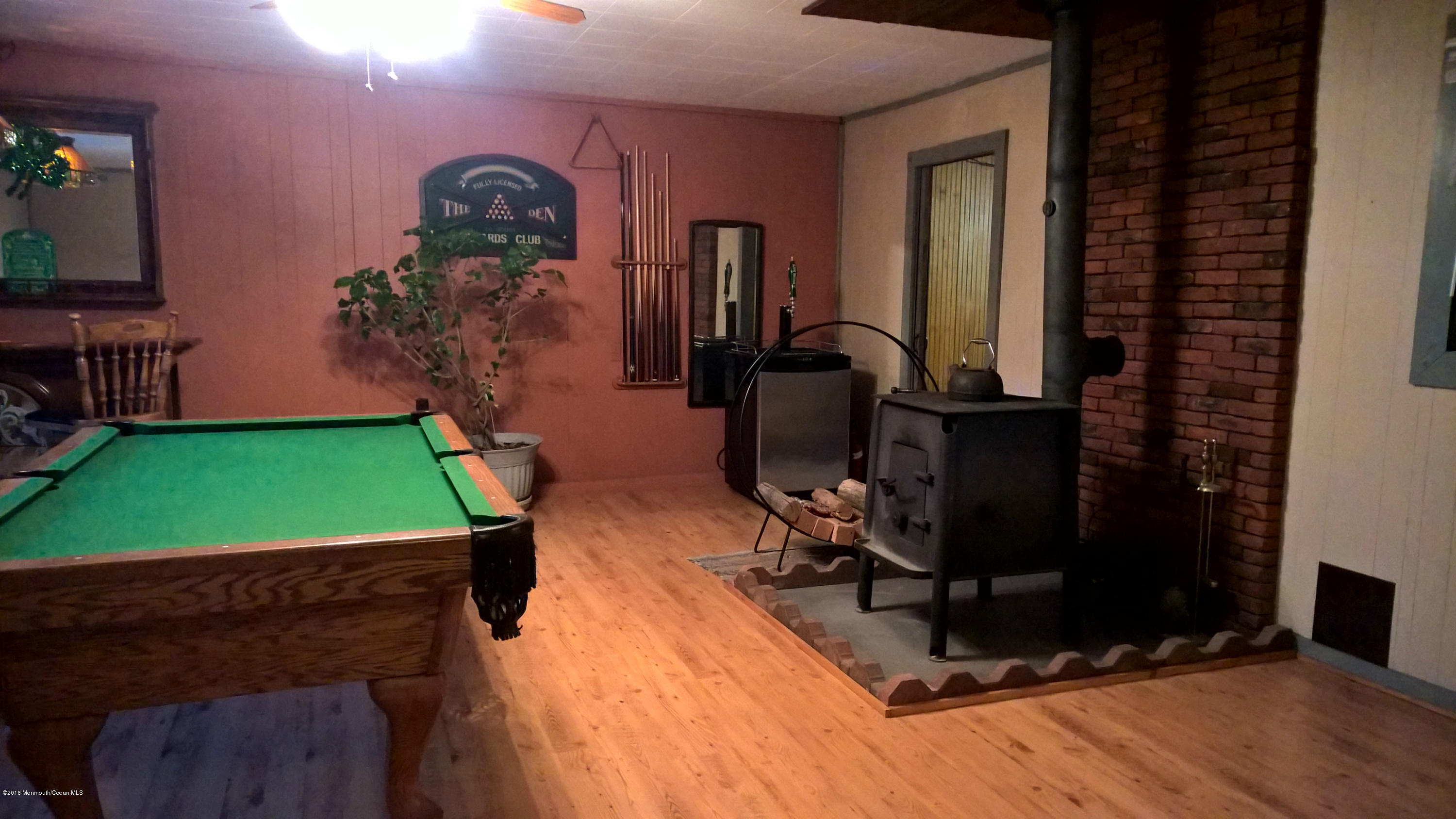 925 Toms River Road Jackson, NJ 08527 - Photo 11 of 27 family room wood stove