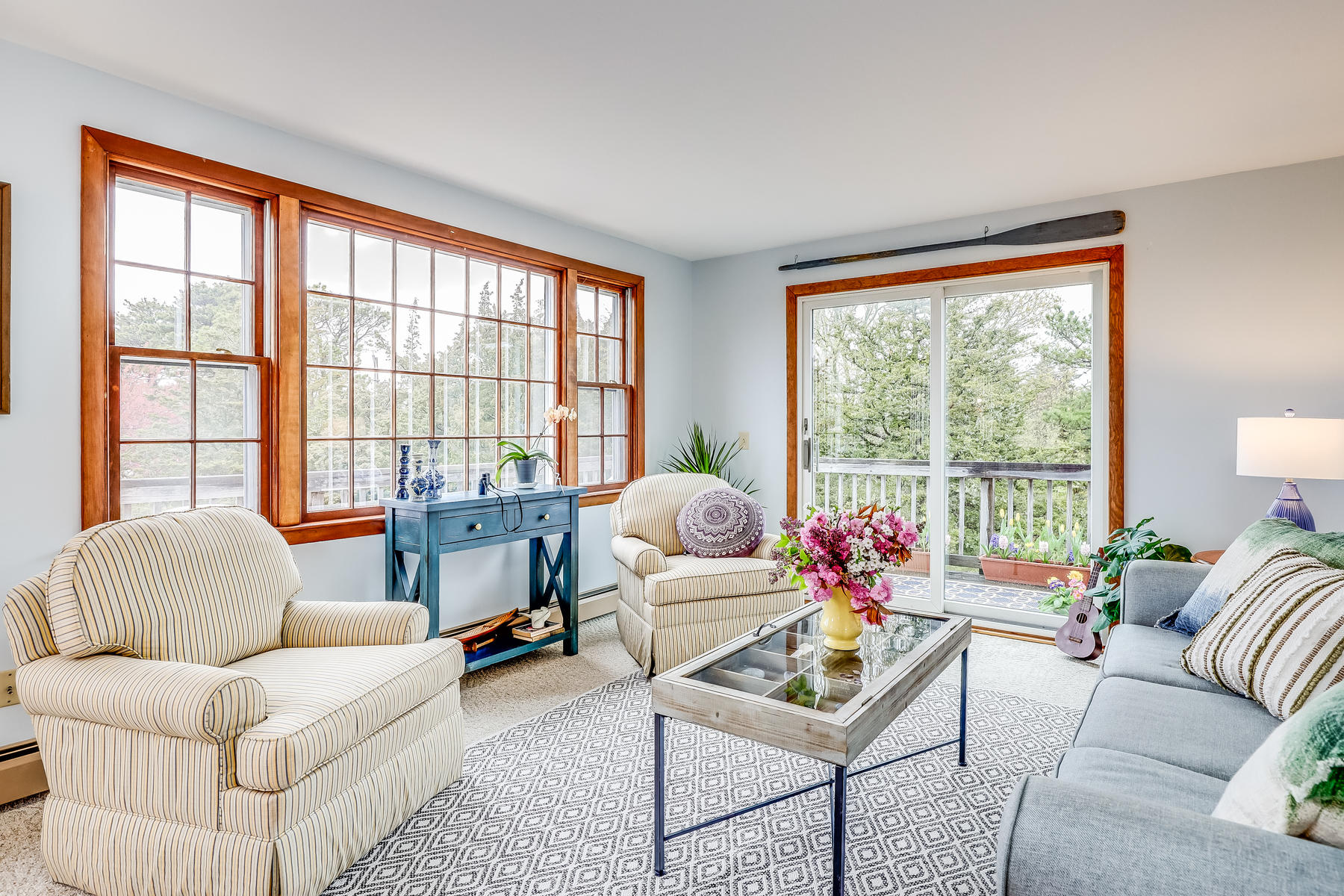 22 Ruggles Road Orleans, MA 02653 - Photo 12 of 38 a living room with furniture and a large window