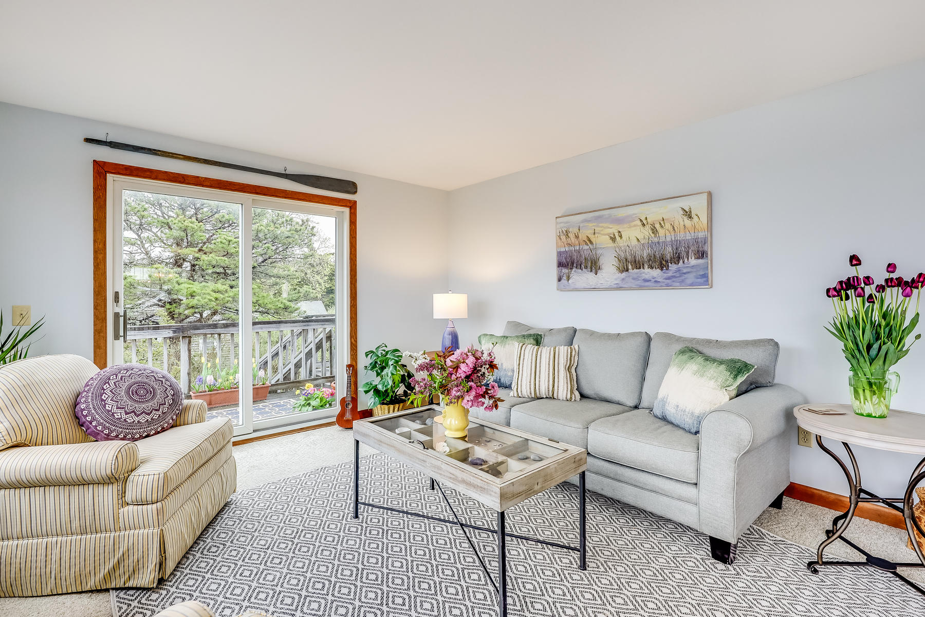 22 Ruggles Road Orleans, MA 02653 - Photo 13 of 38 a living room with furniture and a large window