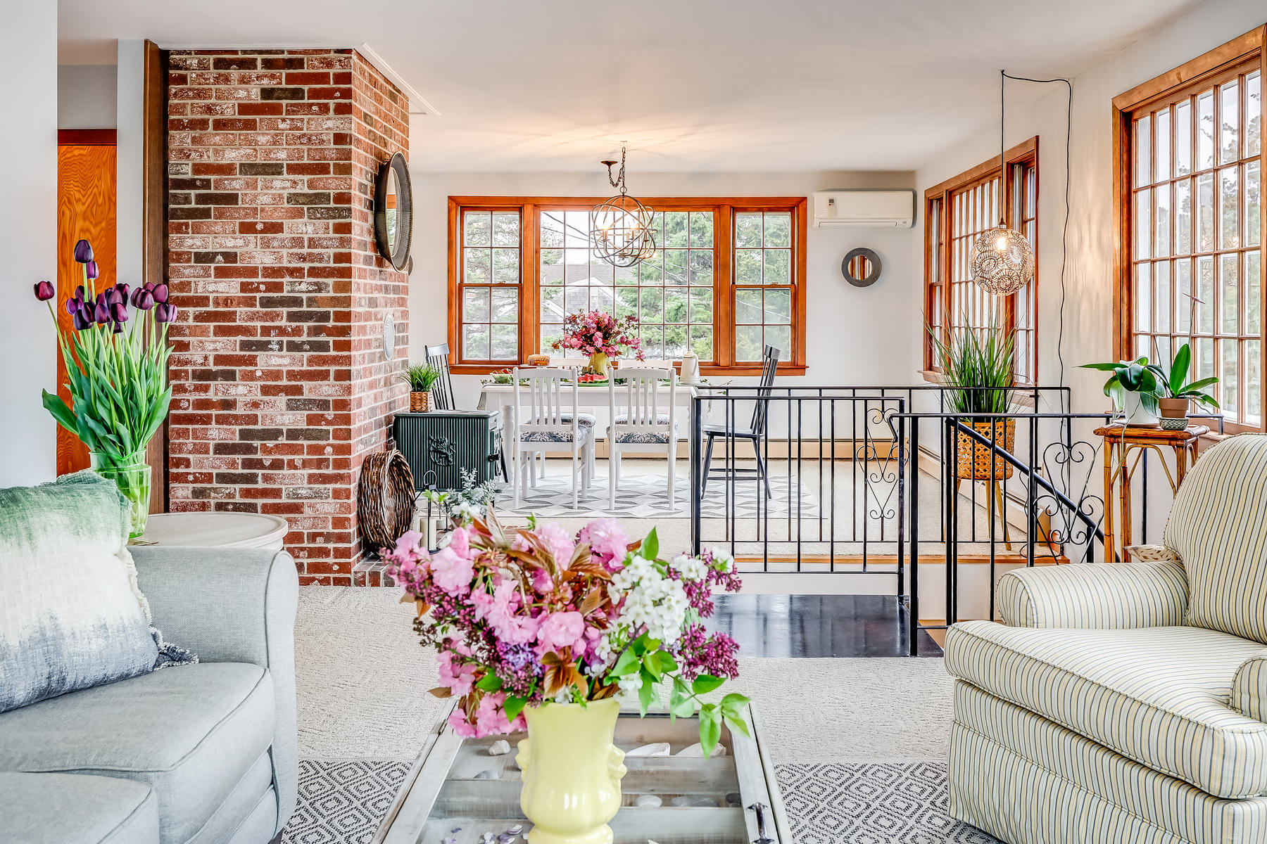 22 Ruggles Road Orleans, MA 02653 - Photo 14 of 38 a living room filled with furniture and a potted plant