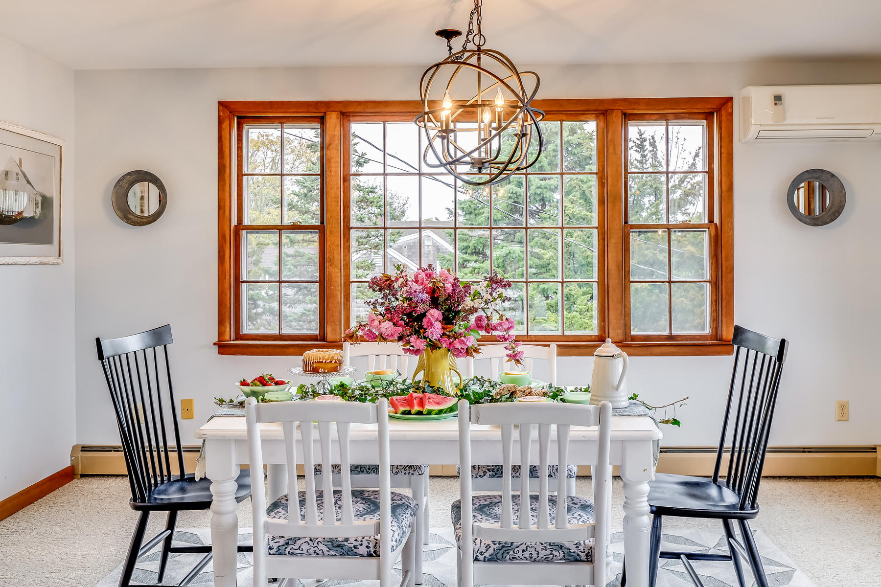 22 Ruggles Road Orleans, MA 02653 - Photo 15 of 38 a view of a dining room with furniture window and outside view