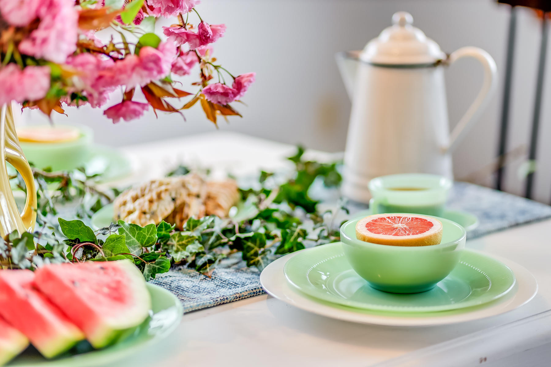 22 Ruggles Road Orleans, MA 02653 - Photo 17 of 38 a white vase with flowers and garden
