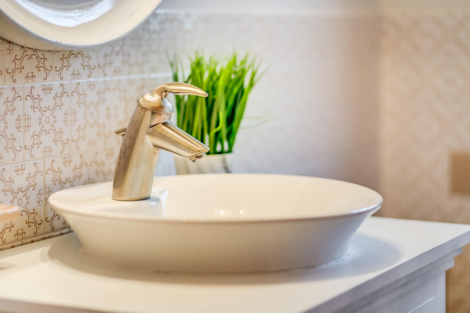 22 Ruggles Road Orleans, MA 02653 - Photo 20 of 38 a white tub sitting in a bathroom