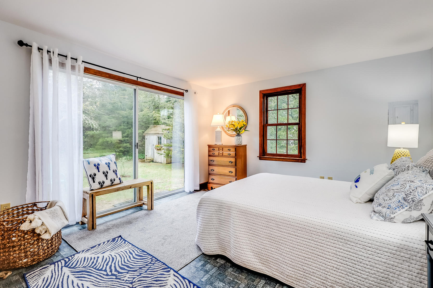 22 Ruggles Road Orleans, MA 02653 - Photo 27 of 38 a bedroom with a large bed and a window