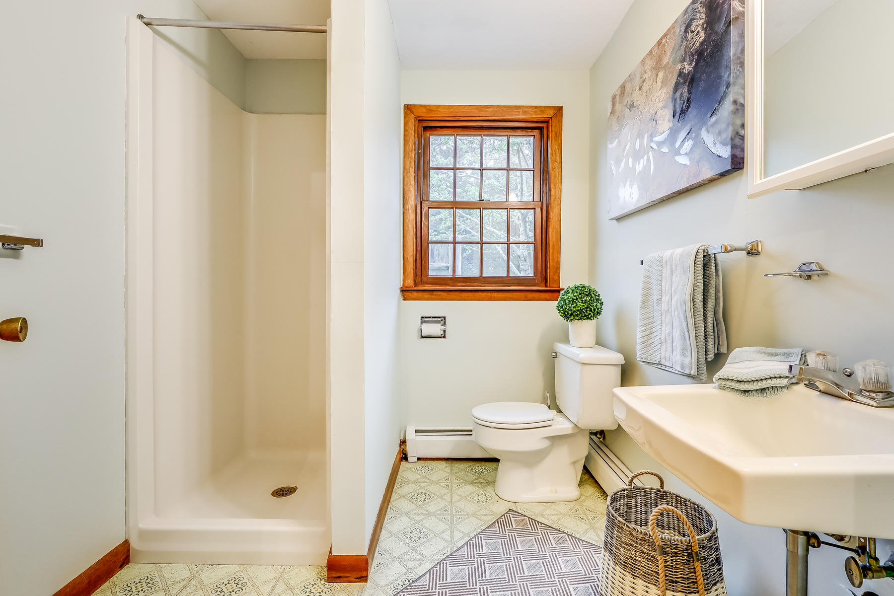 22 Ruggles Road Orleans, MA 02653 - Photo 28 of 38 a bathroom with a sink toilet and shower