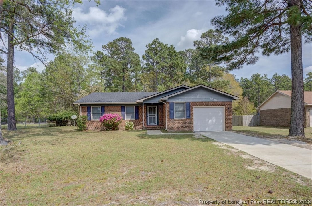 a house with trees in the background