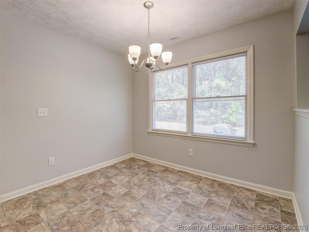 433 Wapiti Drive Spring Lake, NC 28390 - Photo 15 of 31 a view of an empty room with a window