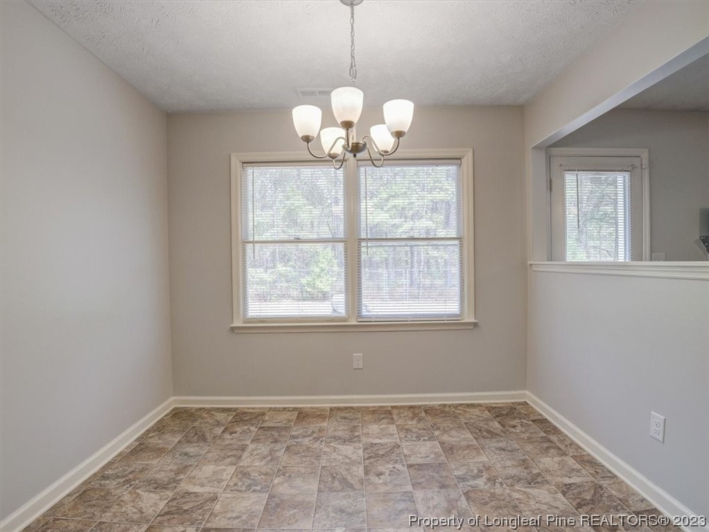 433 Wapiti Drive Spring Lake, NC 28390 - Photo 16 of 31 a view of an empty room with a window