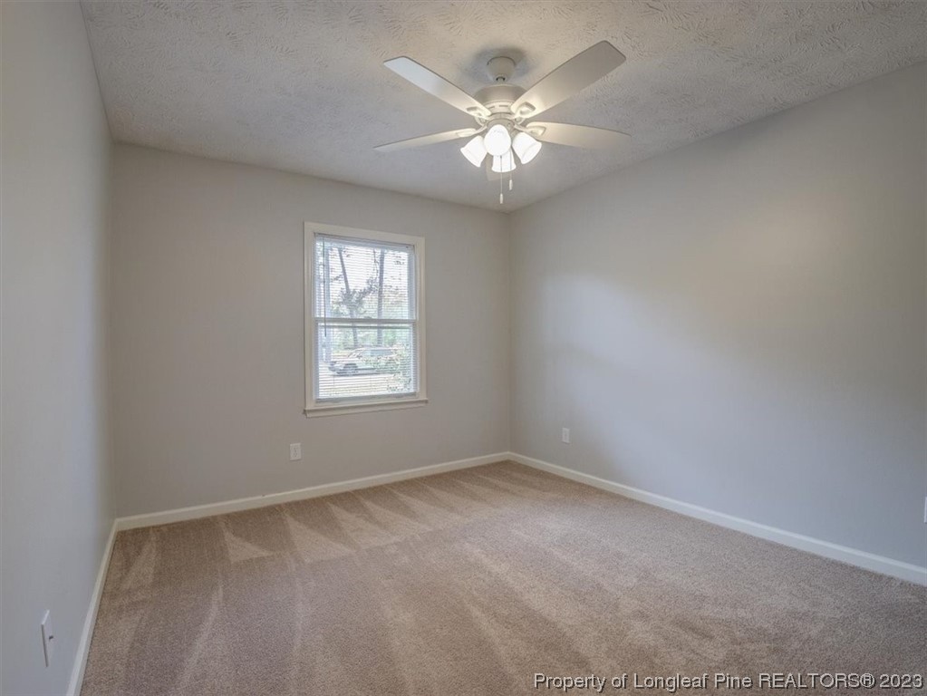 433 Wapiti Drive Spring Lake, NC 28390 - Photo 23 of 31 a view of an empty room with a window