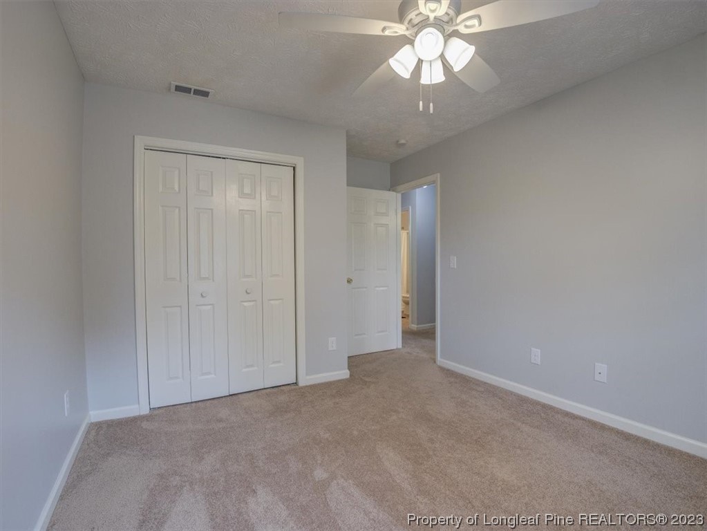 433 Wapiti Drive Spring Lake, NC 28390 - Photo 24 of 31 a view of an empty room and chandelier fan