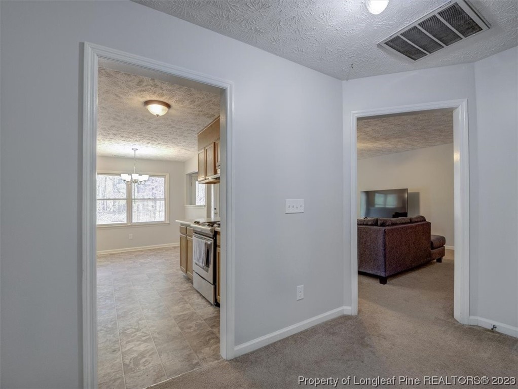 433 Wapiti Drive Spring Lake, NC 28390 - Photo 6 of 31 a view of a hallway