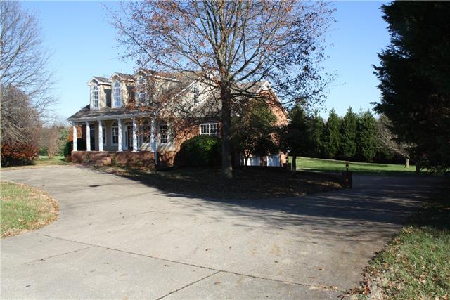 400 Fairway Trail Springfield, TN 37172 - Photo 2 of 20 This house is beautiful from every angle and features a full circle driveway in front as well as a large concrete driveway that goes around to the 2 car garage.
