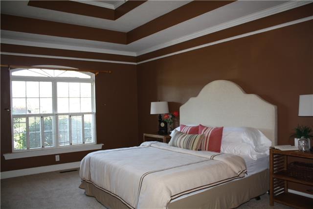 400 Fairway Trail Springfield, TN 37172 - Photo 12 of 20 This master is HUGE, like most of this house. Lots of sunlight with big windows and an impressive tray ceiling. Off the master is a gorgeous master bathroom and walk in closet.