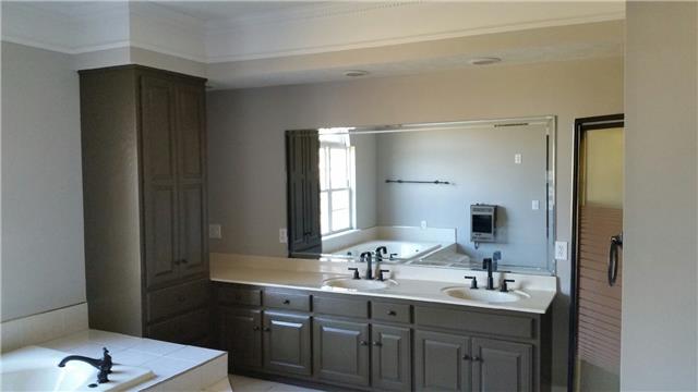 400 Fairway Trail Springfield, TN 37172 - Photo 13 of 20 The master bathroom is spacious and features a large jacuzzi soaking tub, separate shower, lots of cabinet storage and a walk in closet with shoe storage.