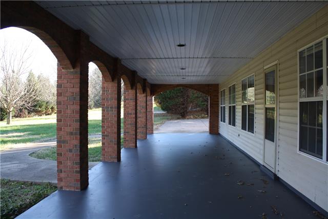 400 Fairway Trail Springfield, TN 37172 - Photo 17 of 20 Outside the basement you will find this enormous covered patio!!! What a beautiful space!