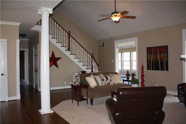 400 Fairway Trail Springfield, TN 37172 - Photo 9 of 20 Here we have the view of the living room from the kitchen. Check out the gorgeous hardwood floors and brand new carpet. Notice the doors open to the large bonus/ sun room!