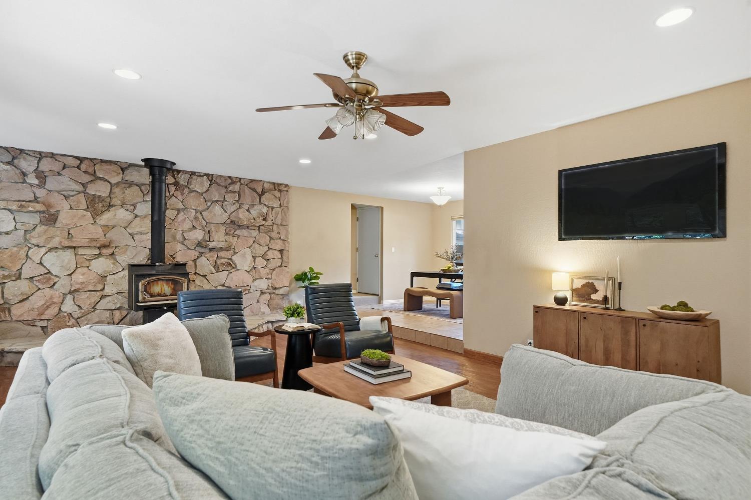 26019 Ridge Drive Pioneer, CA 95666 - Photo 11 of 75 a living room with furniture and a flat screen tv