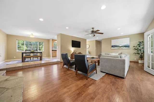 a view of a workspace with a table and couch