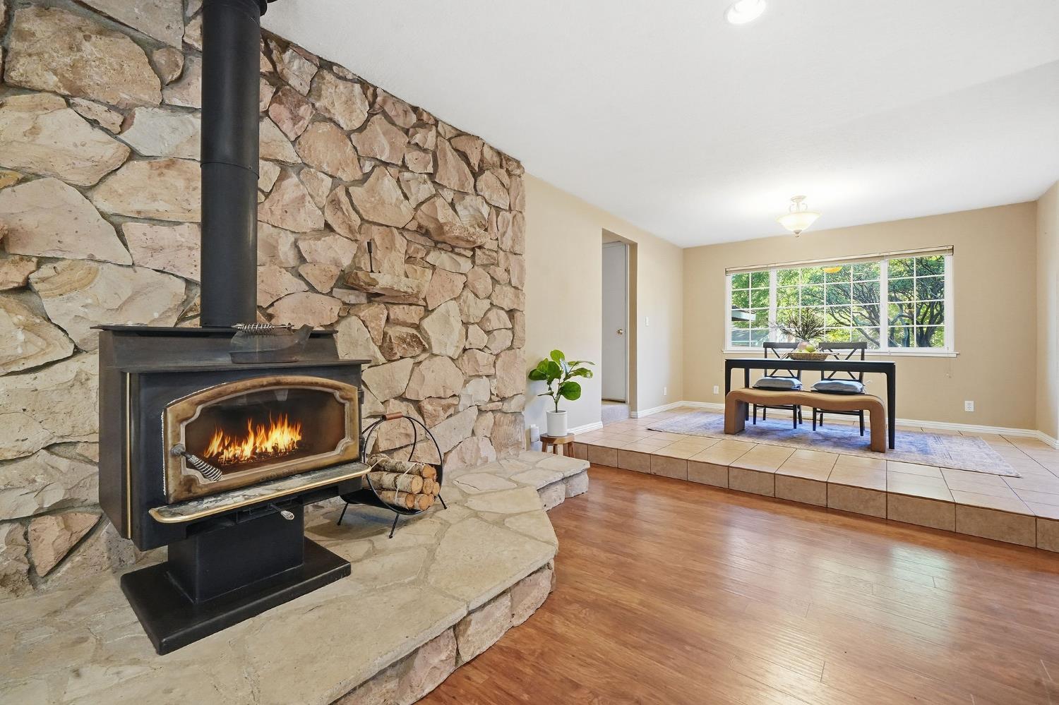 26019 Ridge Drive Pioneer, CA 95666 - Photo 13 of 75 a living room with furniture and a fireplace