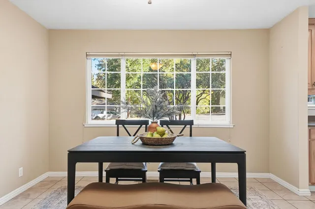 a view of a kitchen and dining room