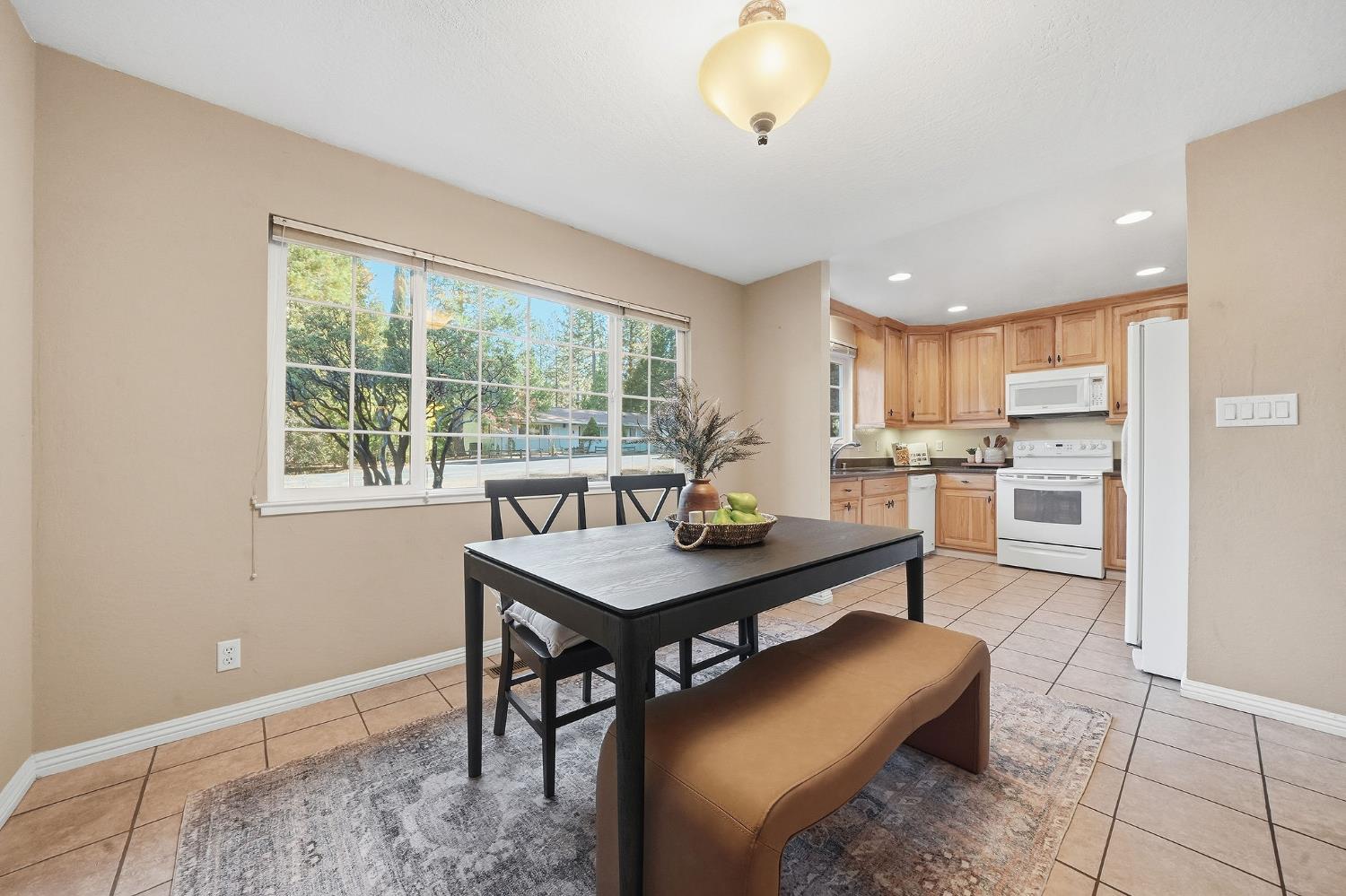26019 Ridge Drive Pioneer, CA 95666 - Photo 16 of 75 a view of a kitchen and dining room