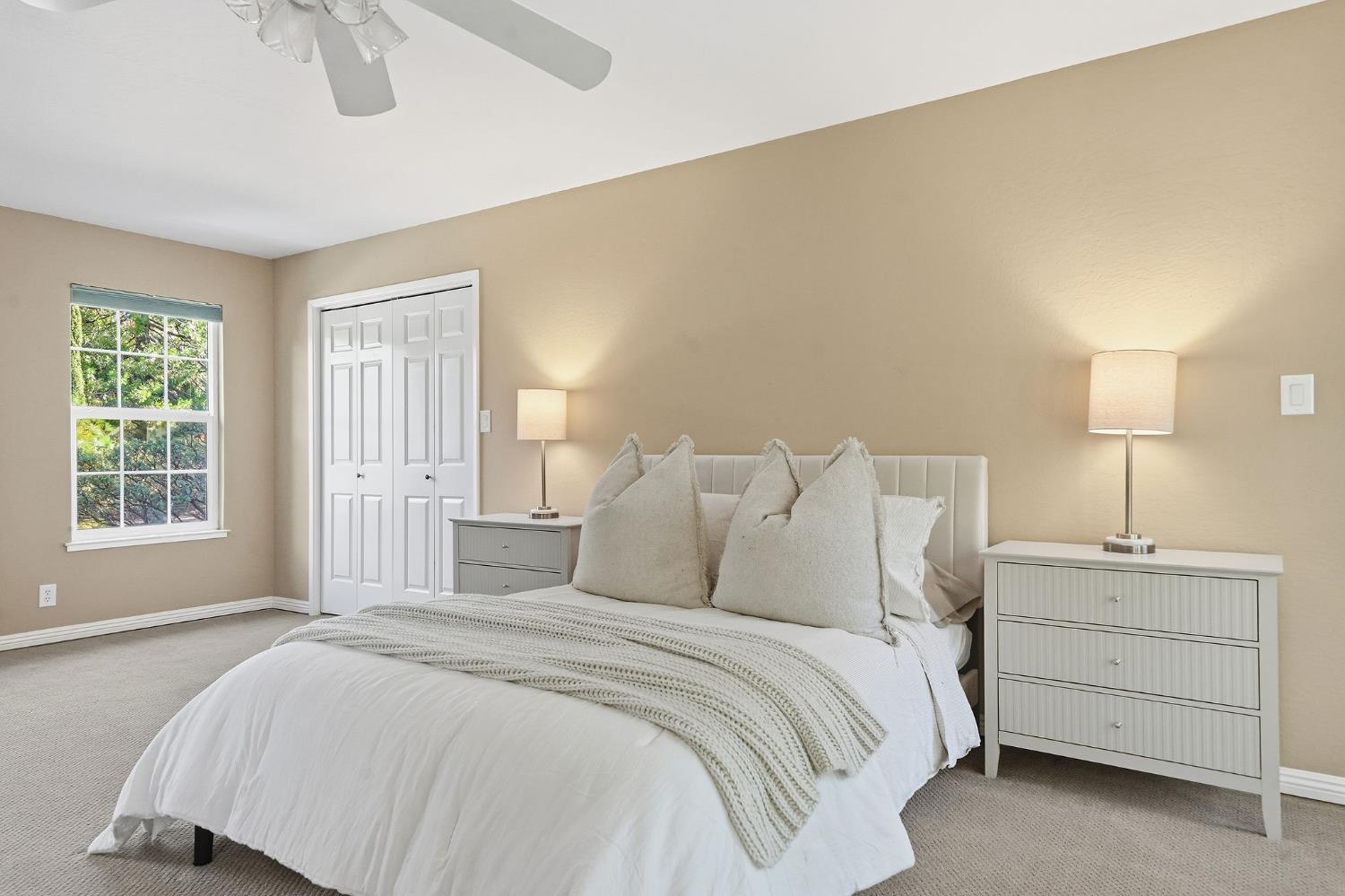 26019 Ridge Drive Pioneer, CA 95666 - Photo 23 of 75 a bedroom with a bed and a window