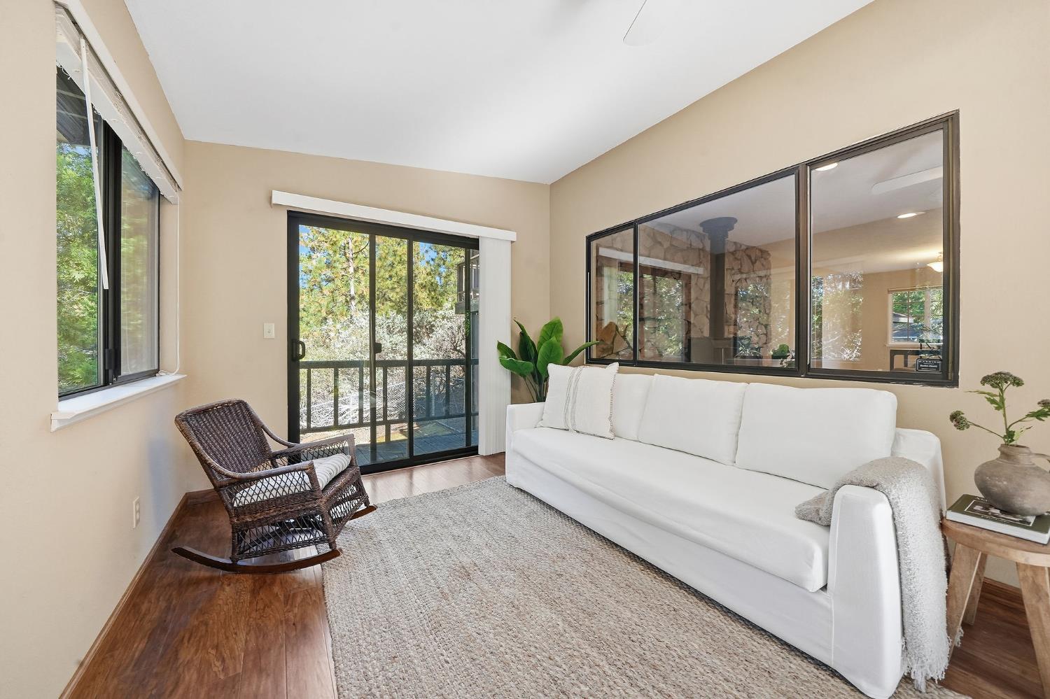 26019 Ridge Drive Pioneer, CA 95666 - Photo 37 of 75 a living room with furniture and a large window