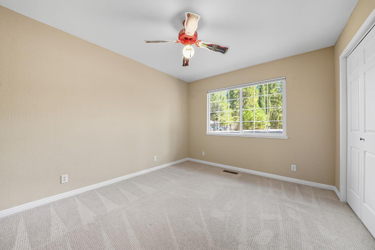26019 Ridge Drive Pioneer, CA 95666 - Photo 41 of 75 wooden floor in an empty room with a window