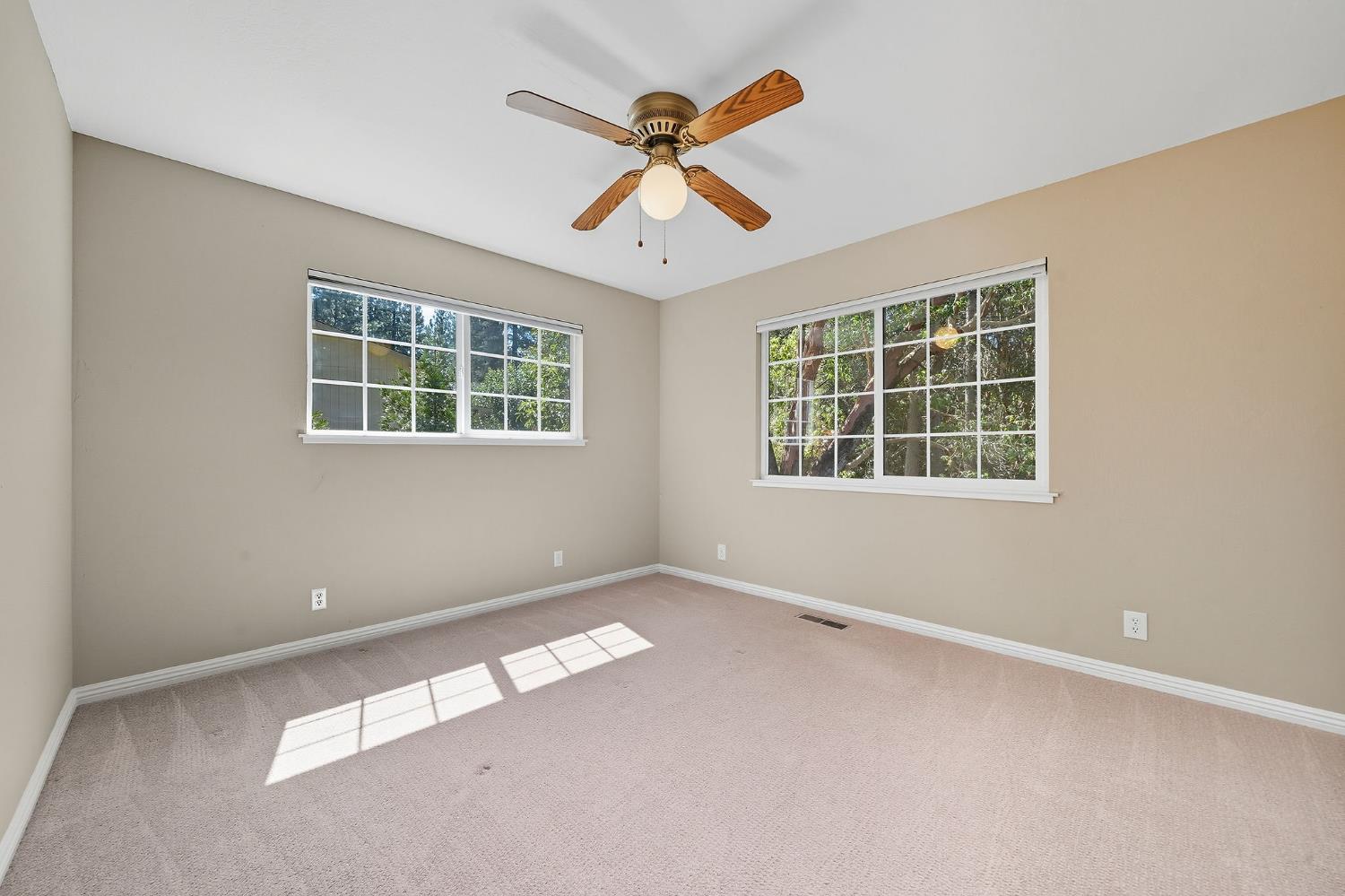 26019 Ridge Drive Pioneer, CA 95666 - Photo 46 of 75 an empty room with windows and ceiling fan
