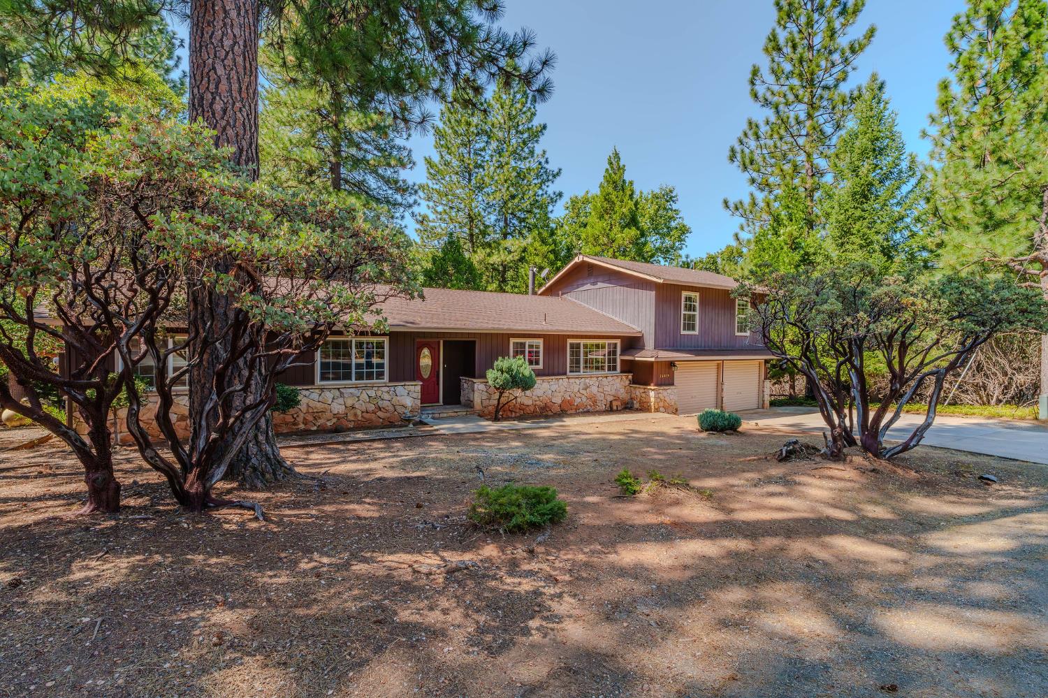 26019 Ridge Drive Pioneer, CA 95666 - Photo 50 of 75 a front view of a house with a garden