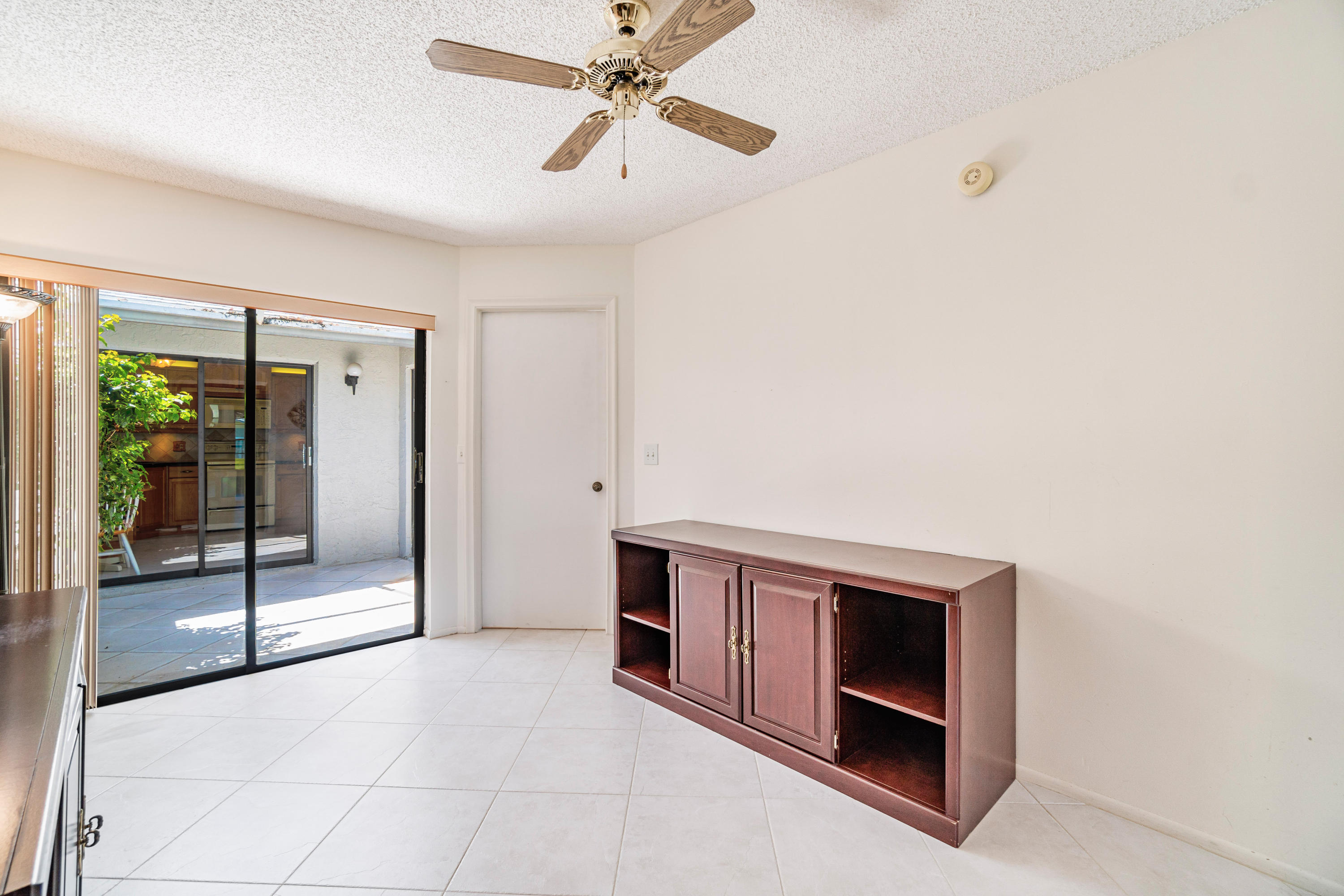 9159 Southwest 22nd Street, Unit D Boca Raton, FL 33428 - Photo 25 of 35 a view of a livingroom with a flat screen tv