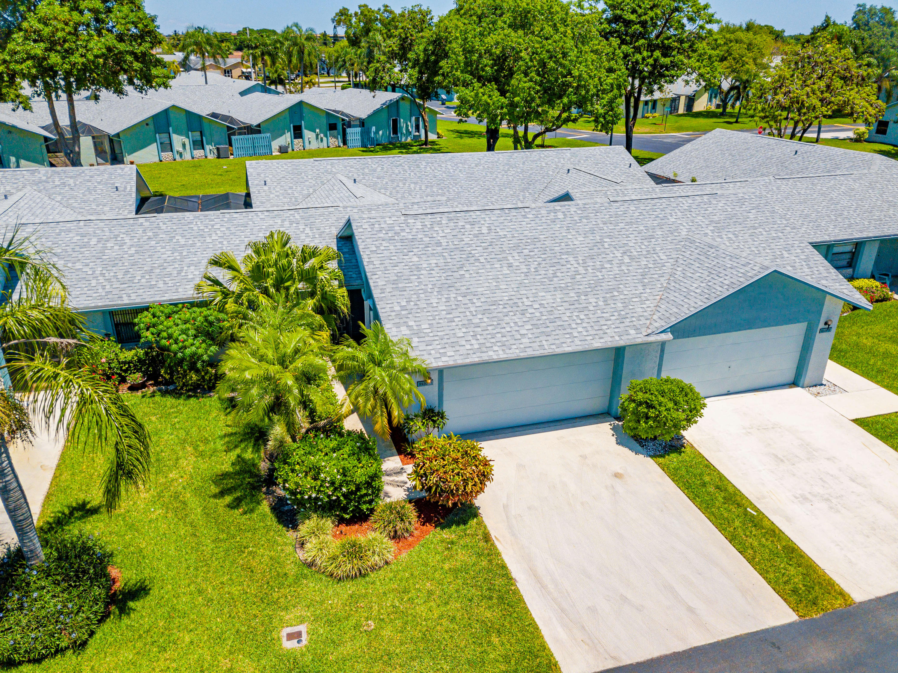9159 Southwest 22nd Street, Unit D Boca Raton, FL 33428 - Photo 33 of 35 an aerial view of a house with a yard