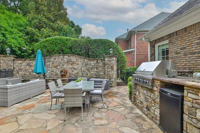 a view of backyard with seating space