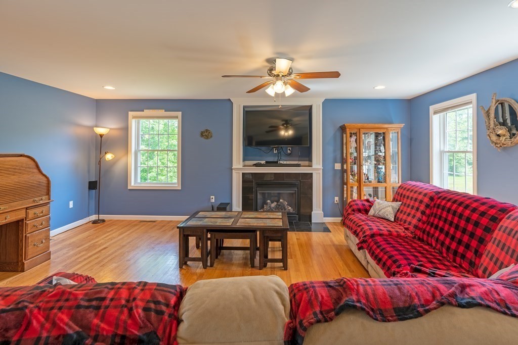41 Waid Road Monson, MA 01057 - Photo 15 of 29 a living room with furniture a fireplace and a window
