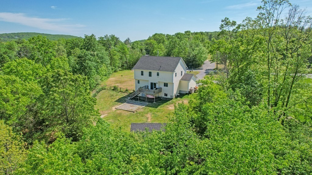 41 Waid Road Monson, MA 01057 - Photo 26 of 29 an aerial view of a house with a yard