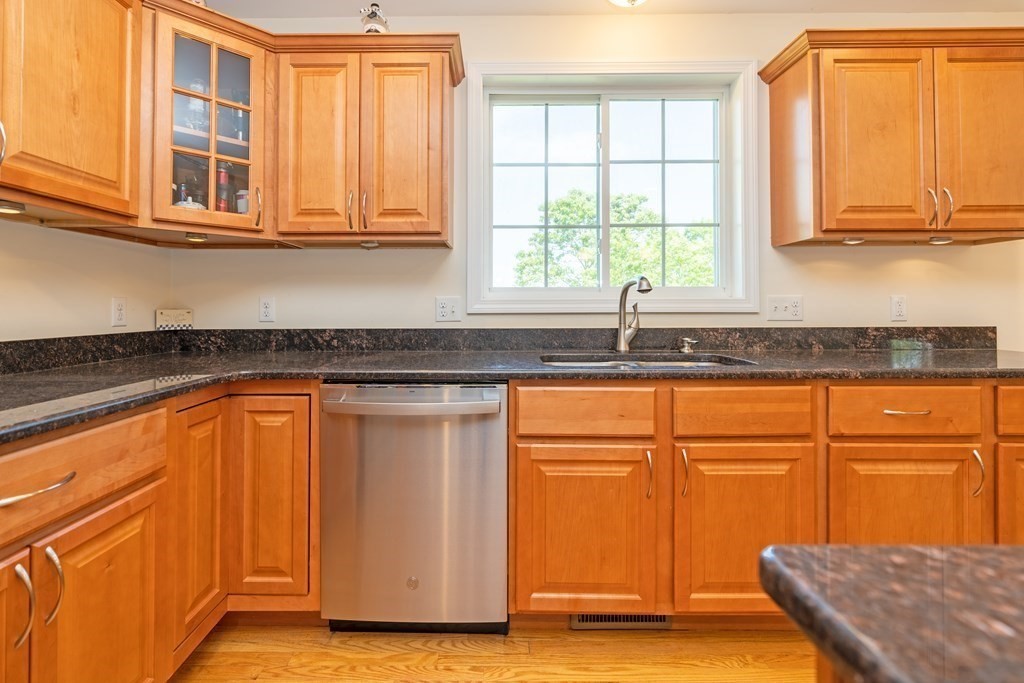 41 Waid Road Monson, MA 01057 - Photo 8 of 29 a kitchen with granite countertop cabinets sink and window
