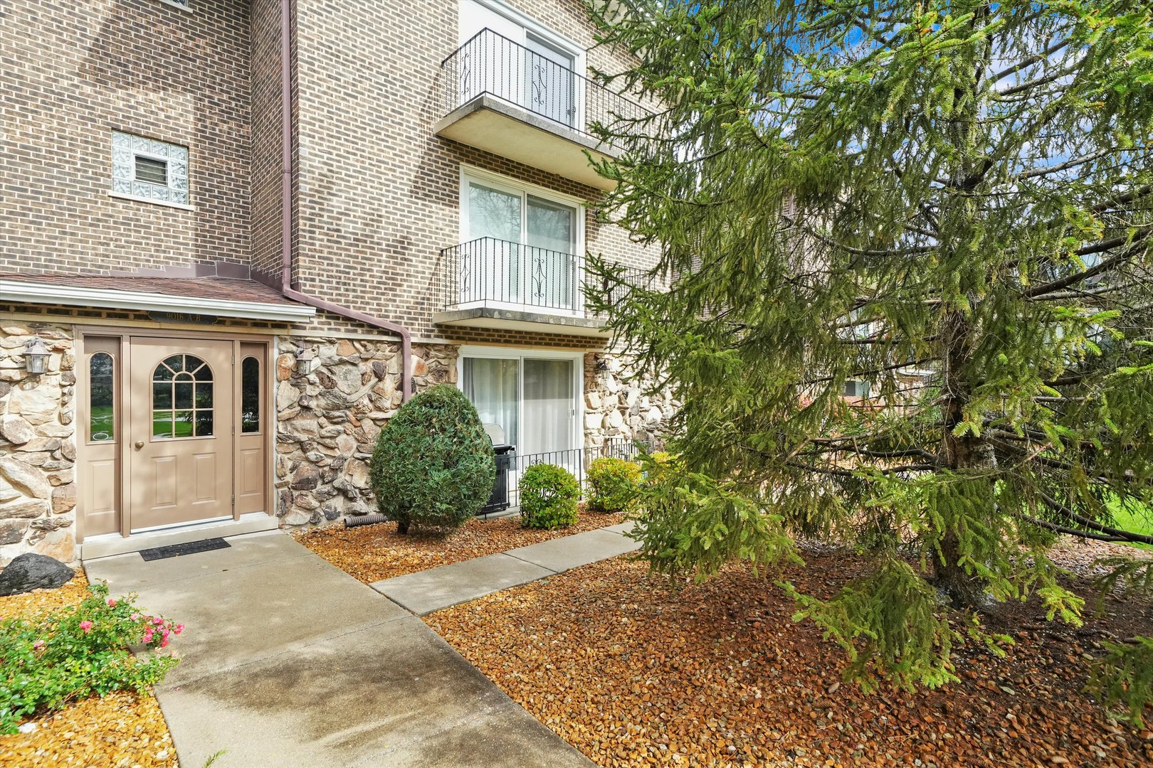 9016 West 140th Street, Unit 3A Orland Park, IL 60462 - Photo 24 of 25 front view of a house